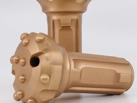 110型尖齿与球齿潜孔钻头：破岩哲学对决与应用